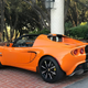 Illustration for article titled For $29,999, Could This Orange And Black 2005 Lotus Elise Have You Ready For Halloween?